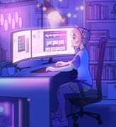 A girl sitting in front of a computer monitor with Steam client opened.