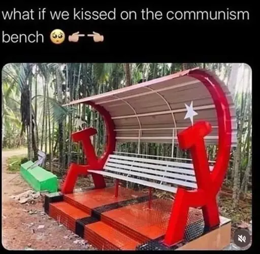 "what if we kissed on the communism bench 🥺👉👈" A picture of a bench with a red hammer and sickle on each side with a white star over them.  